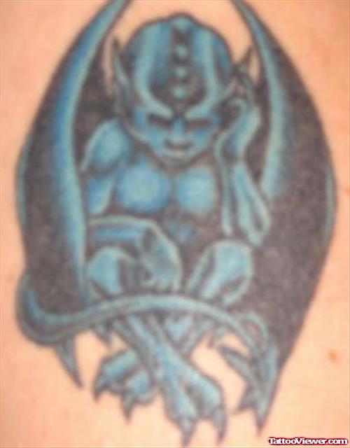 Cool Blue Ink Gargoyle Tattoo