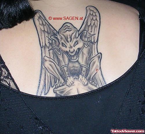 Grey Ink Gargoyle Tattoo On Upperback