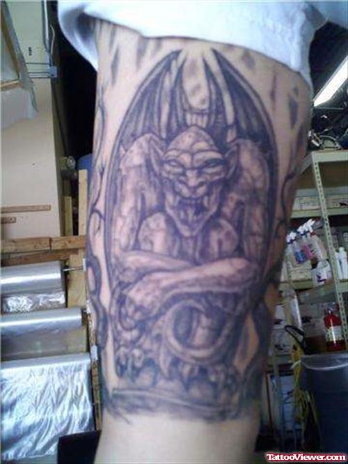 Grey Ink Gargoyle Tattoo On Leg