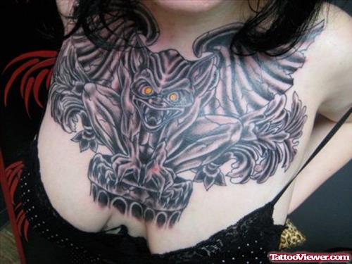 Gargoyle Tattoo On Girl Chest