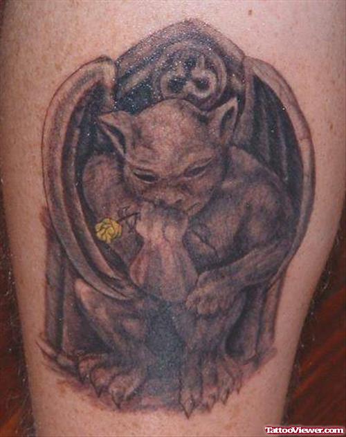 Awesome Grey Ink Gargoyle Tattoo On Bicep