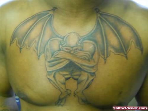 Bat Man Sitting Sad Tattoo On Chest