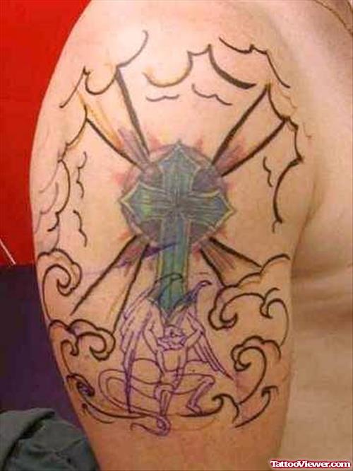 Gargoyle Cross Tattoo On Biceps