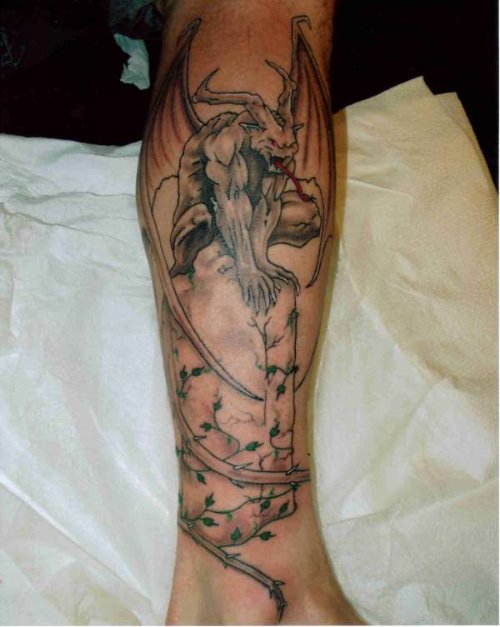 Nice Grey Ink Gargoyle Tattoo On Leg