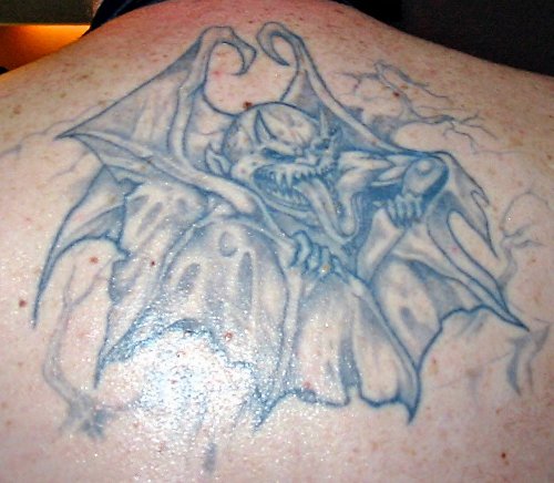 Amazing Grey Ink Gargoyle Tattoo On Upperback