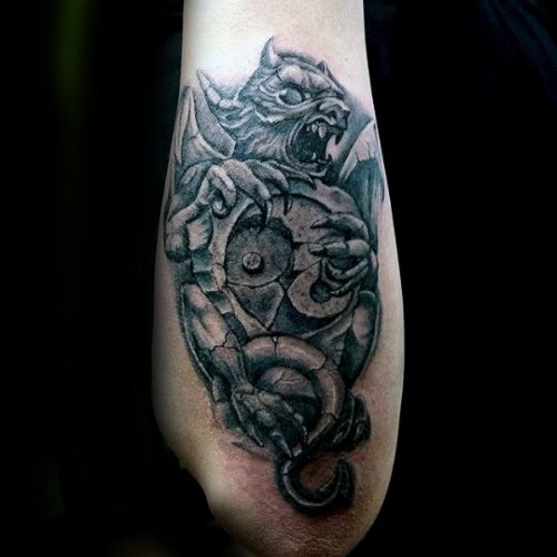 Gargoyle Statue with Yin Yang Symbol Tattoo