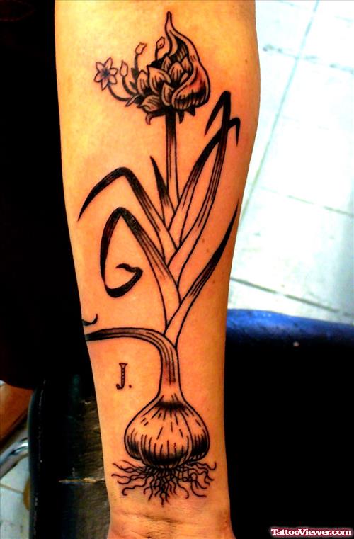 Grey Ink Garlic Tattoo On Left Arm