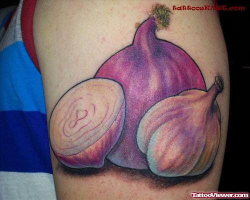 Beautiful Garlic Tattoo On Man Left Shoulder