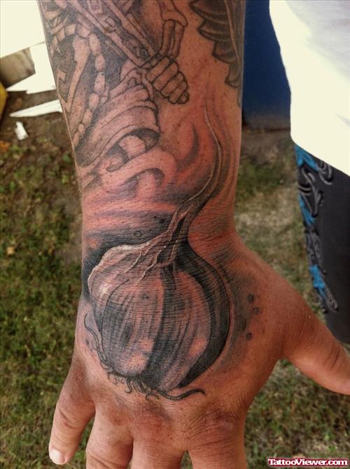 Grey Ink Garlic Tattoo On Right Arm