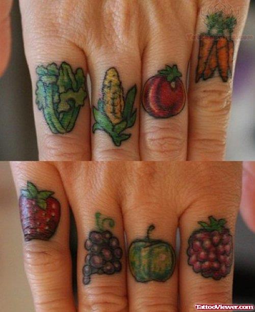 Color Fruits And Garlic Tattoo On Fingers