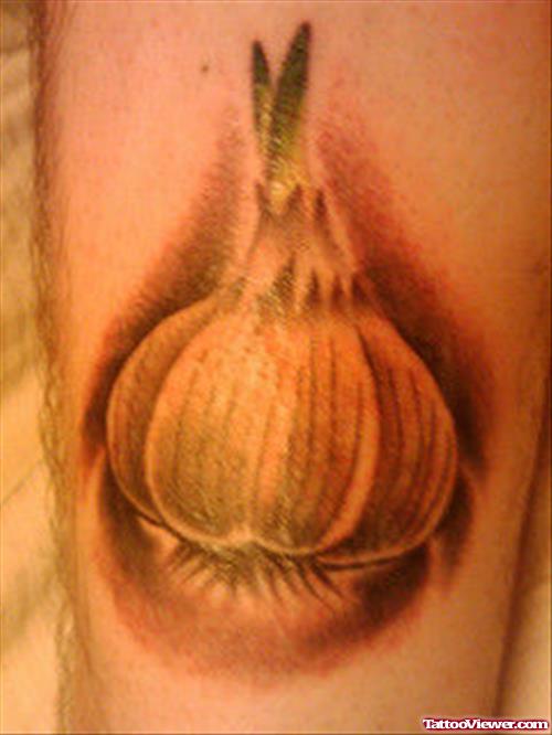 Yellow Ink Garlic Tattoo On Side