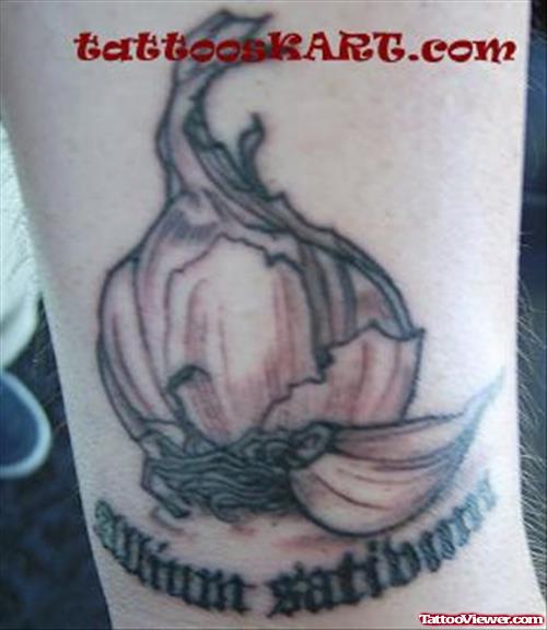 Grey Ink Garlic Tattoo On Biceps