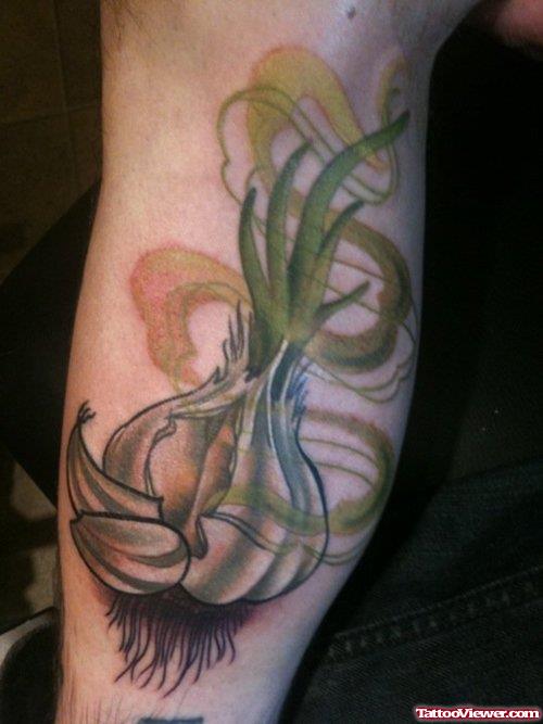 Grey Ink Garlic Tattoo Leg