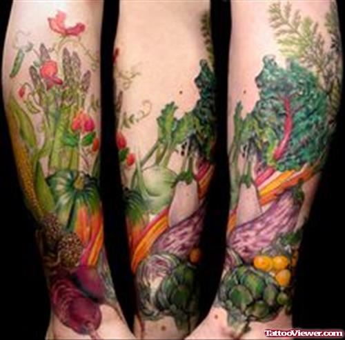 Colored Vegetables And Garlic Tattoo On Leg