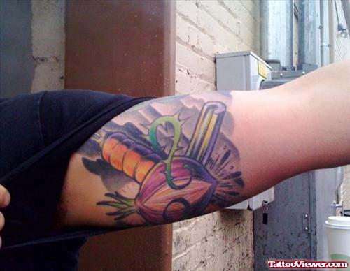 Color Ink Garlic Tattoo On Left Bicep