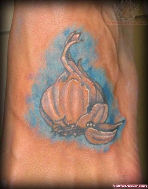 Attractive Grey Ink Garlic Tattoo On Left Sleeve