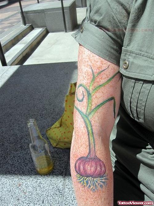 Colored Garlic Tattoo On Arm