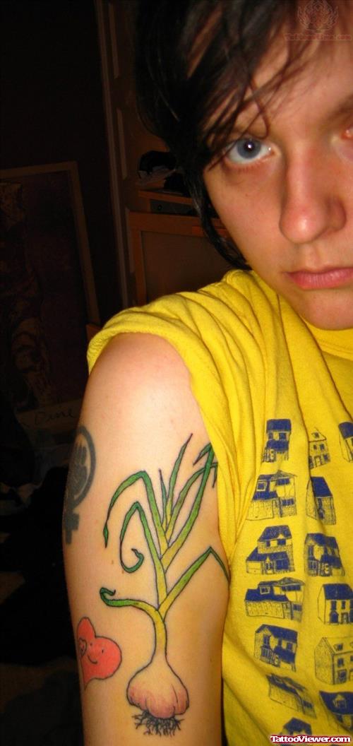 Garlic Tattoo On Half Sleeve