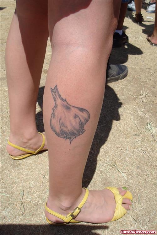 Garlic Tattoo On Girl Calf