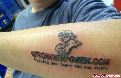 Grown Up Geek Tattoo On Left Arm