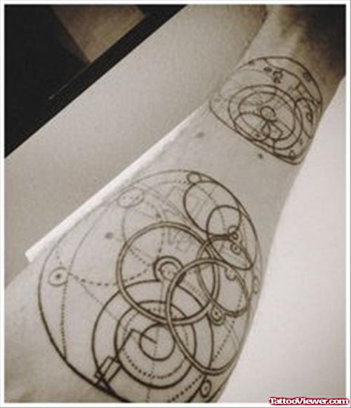 Grey Ink Geek Tattoo On Left Forearm