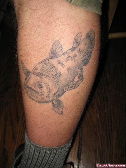 Grey Ink Fish Geek Tattoo On Leg