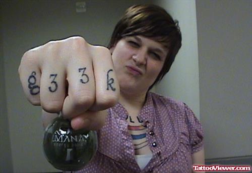 Geek Tattoo On Lady Fingers
