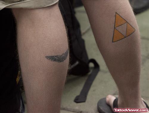 Geek Tattoo On Back Legs