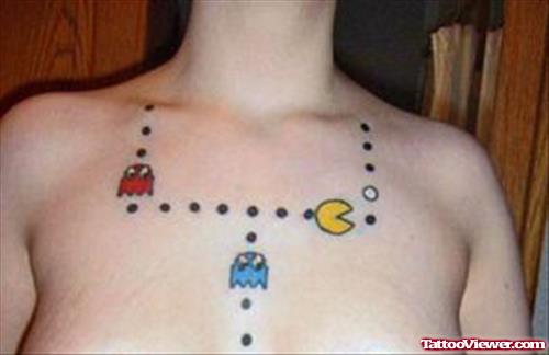 Color Pacman Geek Tattoo On Girl Chest