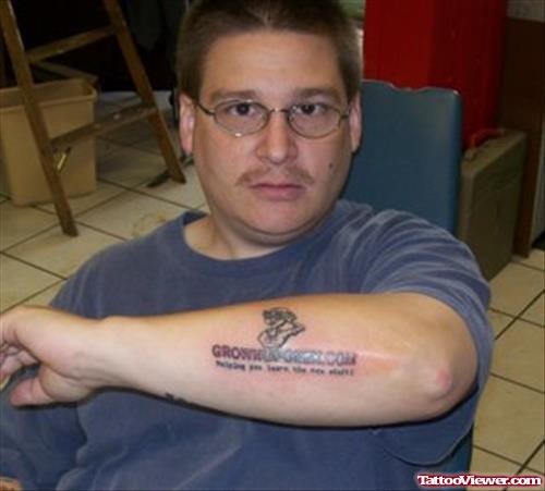Grown Geek Tattoo On Man Left Arm