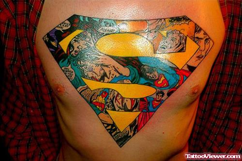 Colored Superman Logo Geek Tattoo On Chest