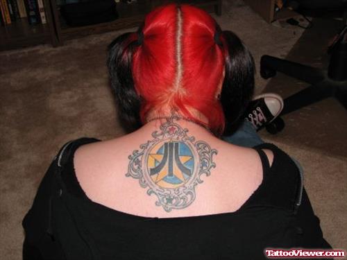 Colored Geek Tattoo On Girl Upperback