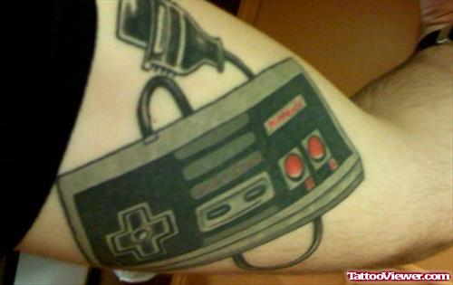 Video Game Remote Geek Tattoo On Bicep