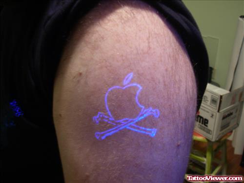 Black Light Apple Geek Tattoo On Left Shoulder