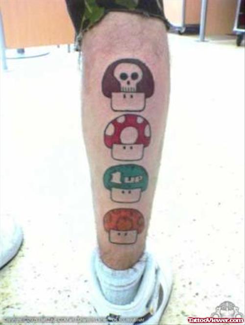 Colored Mario Mushrooms Geek Tattoo On Back Leg
