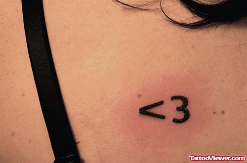 Black Ink Geek Tattoo On Girl Back