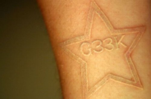 White Ink Star and Geek Tattoo