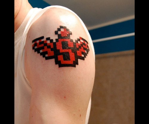 Red Ink Animated Geek Tattoo On Left Shoulder