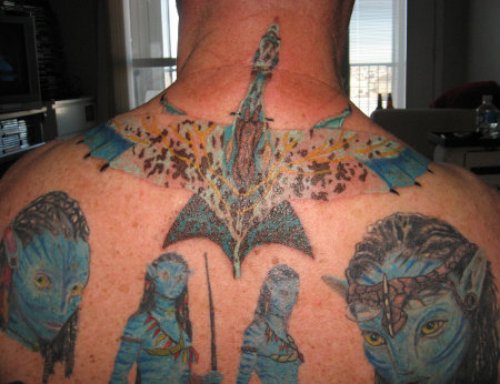 Blue Ink Avatar Geek Tattoo On Upperback