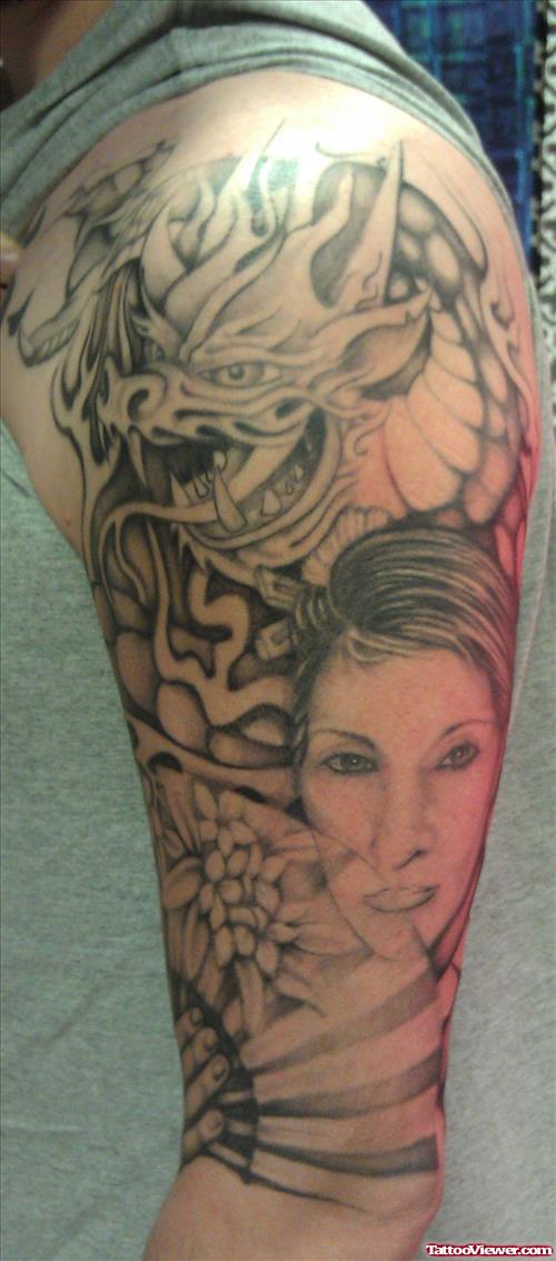 Grey Ink Geisha Tattoo On Man Left Sleeve
