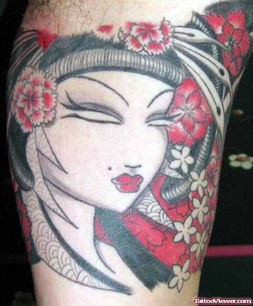 Red Flowers And Geisha Girl Head Tattoo On Bicep