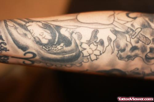 Grey Ink Geisha Tattoo On Arm