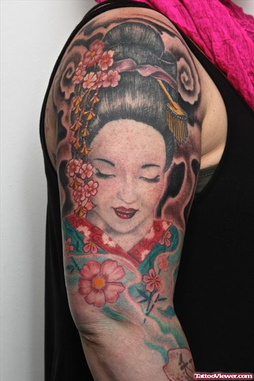 Colored Ink Geisha Tattoo On Right Sleeve