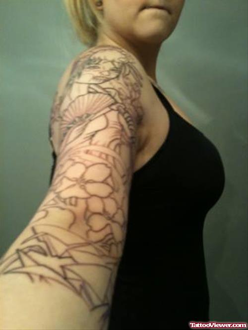 Grey Ink Flowers And Geisha Tattoo On Right Sleeve