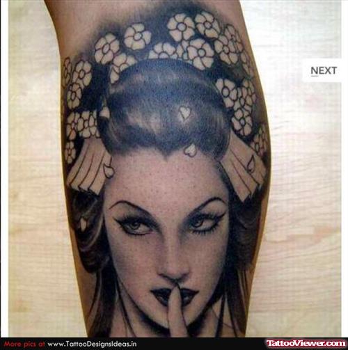 Attractive GRey Ink Geisha Tattoo On Leg