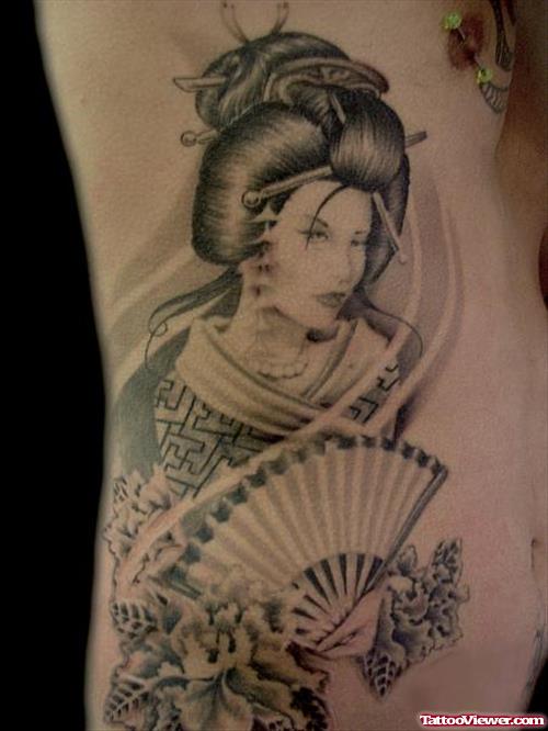Grey Ink Geisha Tattoo On Rib Side