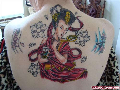 Grey Flowers And Geisha Tattoo On Back