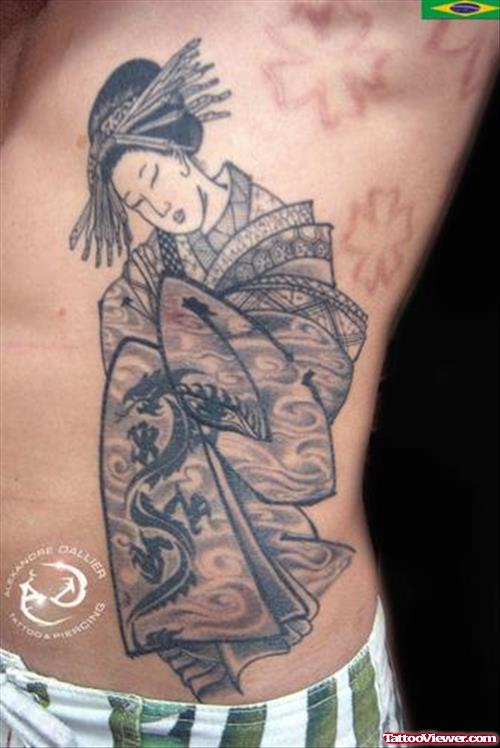 Grey Ink Geisha Tattoo On Rib