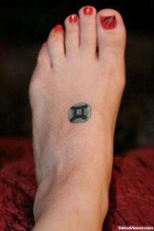Small Zodiac Sign Of Gemini Tattoo On Left Foot