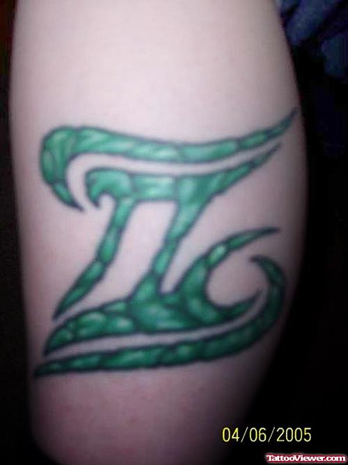 Green Ink Gemini Tattoo On Arm